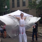 Katie Mesmerie - Stilt Walking with Isis Wings